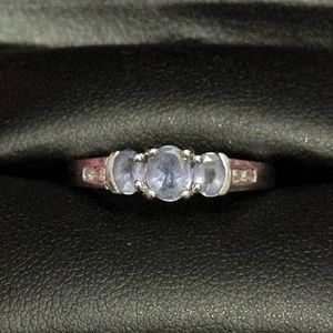 3/4 ct Genuine Tanzanite with 1/4 ct white diamond accents in 10k white…